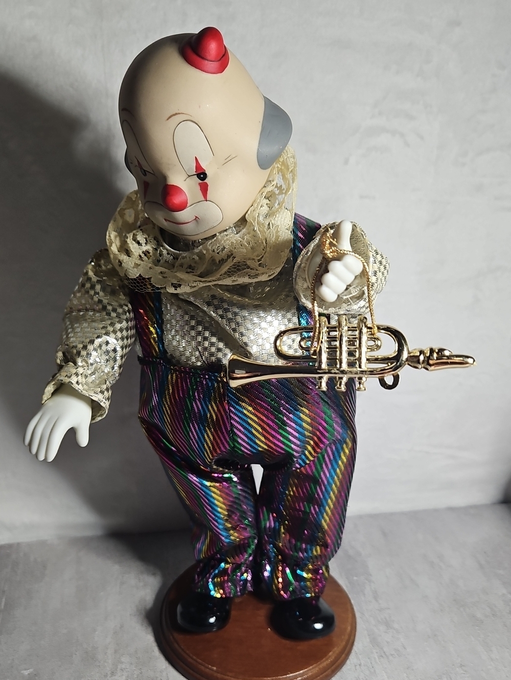 Wind up musical figurine. Plays music and moves perfectly. New Orleans 1984
